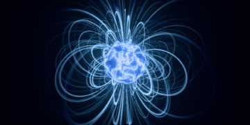 Interior de un reactor de fusión nuclear tipo tokamak con plasma brillante suspendido en el centro.
