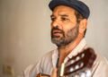 Guitarra acústica en concierto de música folklórica argentina, referencia al nuevo álbum de Duratierra.