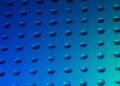 Gotas de agua y aceite sobre superficie que representa la tecnología de separación desarrollada en China.